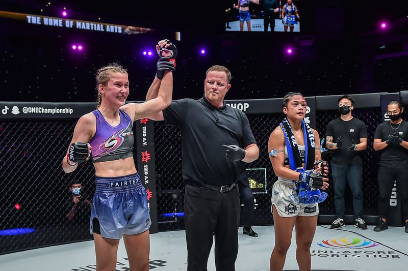 Smilla Sundell having her hand raised in victory by the referee after a fight